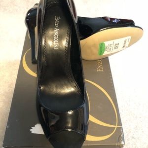 Black 8M heels, never worn, peekaboo toe.